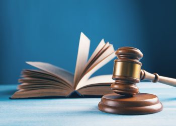 open book on brown wooden table
