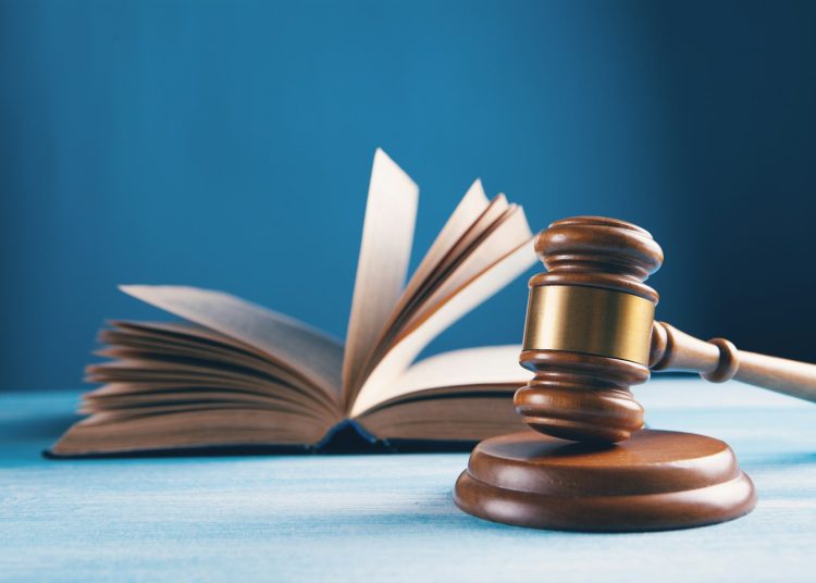 open book on brown wooden table